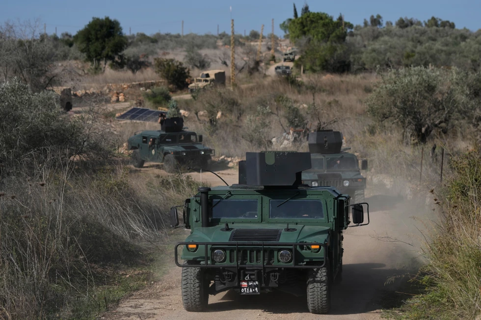 Israel Lebanese conflict: Military vehicles on dirt road