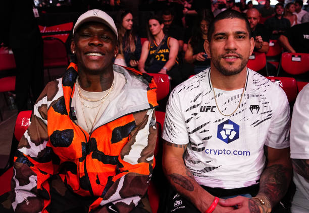 Top 5 Wholesome UFC Moments of 2025: Israel Adesanya and Alex Pereira are seen in attendance during the UFC 312 event 